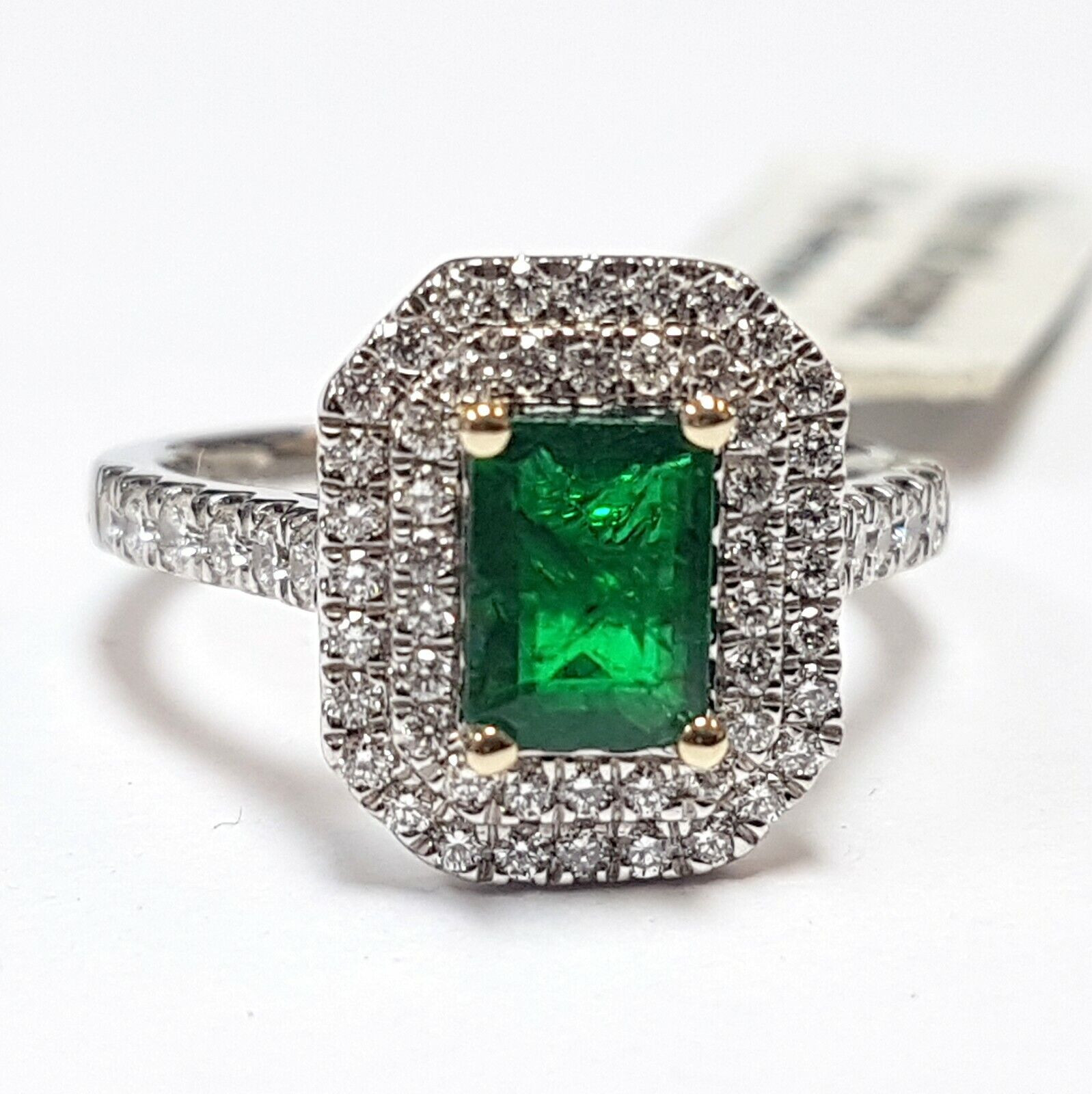 Diamond surrounded sale by emeralds