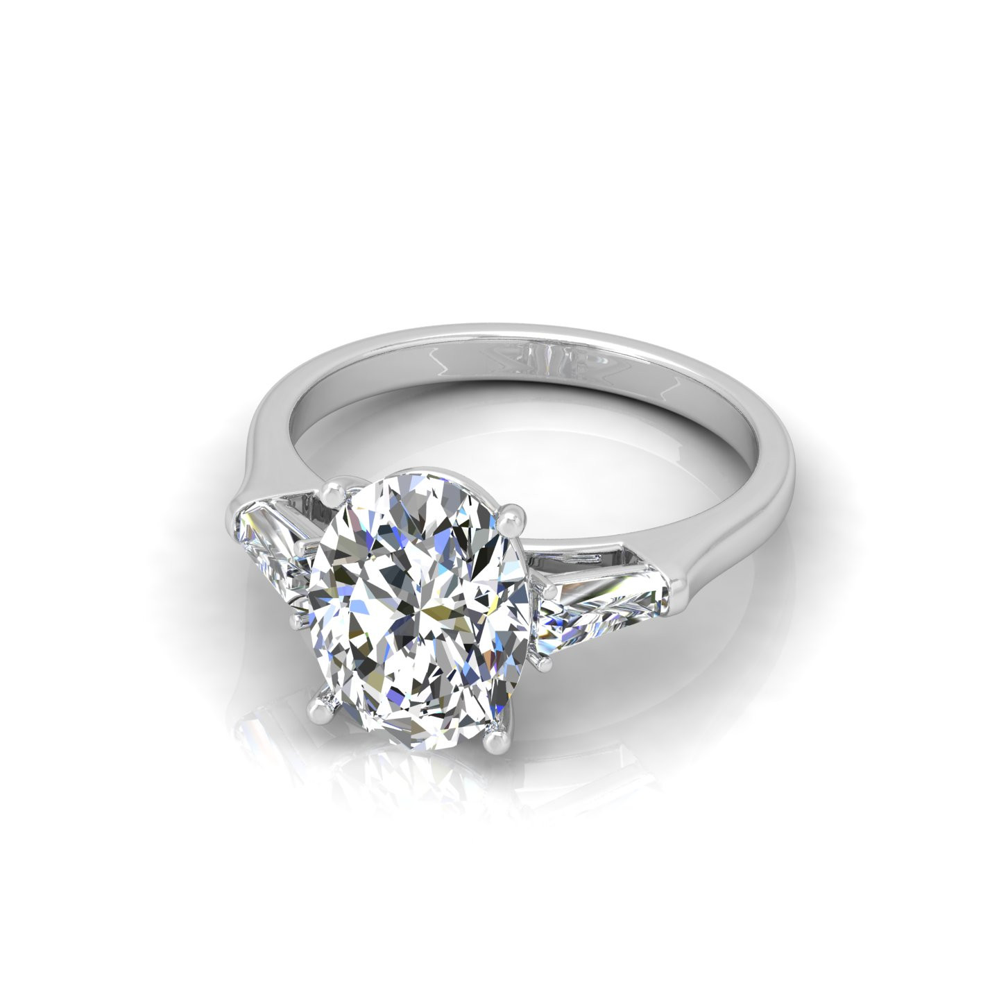 Oval With Tapper Baguette Diamond Trilogy Ring