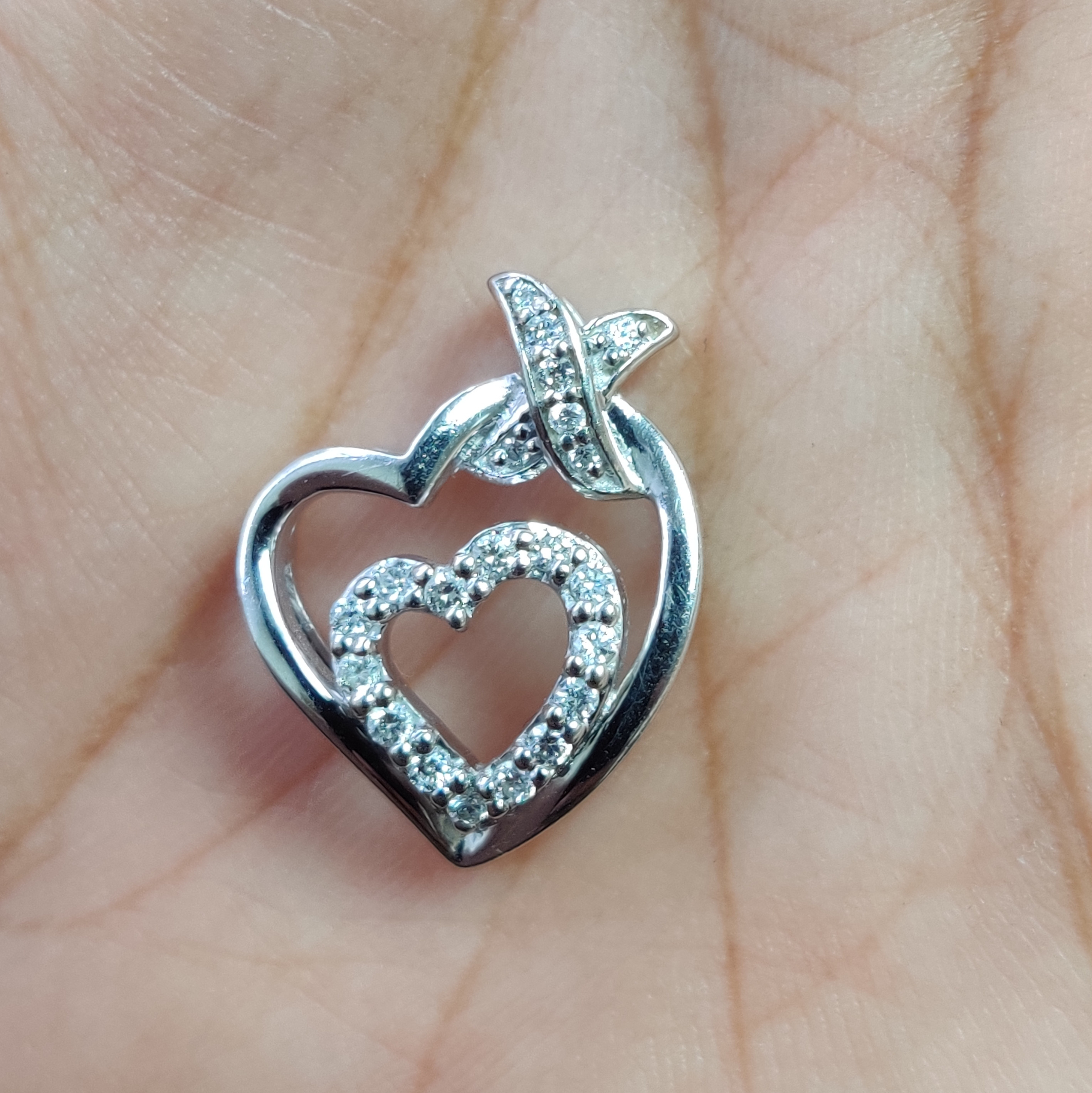 0.50 carat  Enchanted round diamond heart pendant 18k white gold for her.